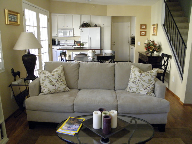 1031 Olympic Lane Seaside, CA 93955 - Photo 9 of 18 a living room with furniture and a chandelier
