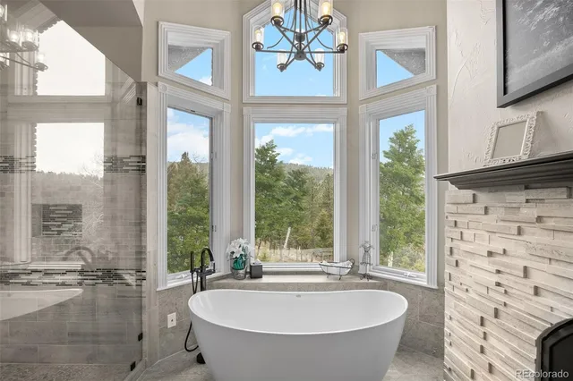 a bath tub sitting in front of a window