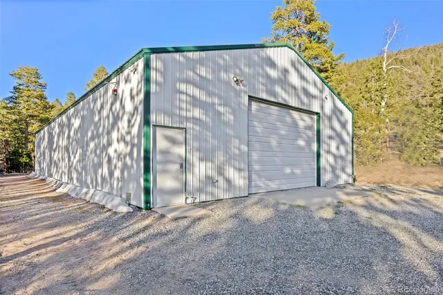 a view of a wooden door with a house