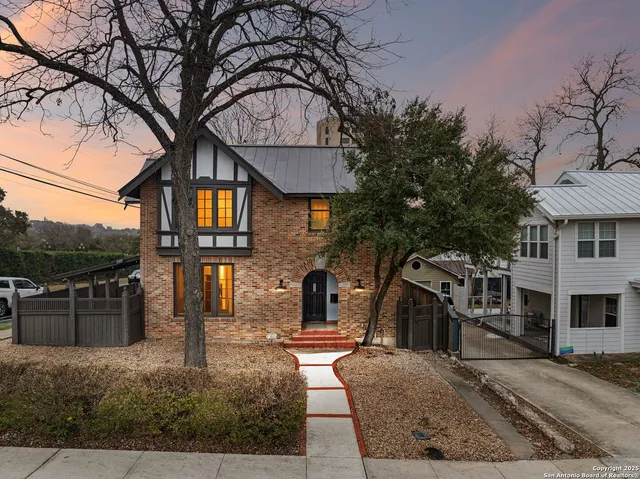 a front view of a house with yard