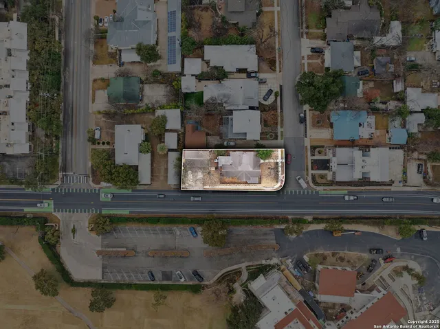 a view of swimming pool with outdoor seating