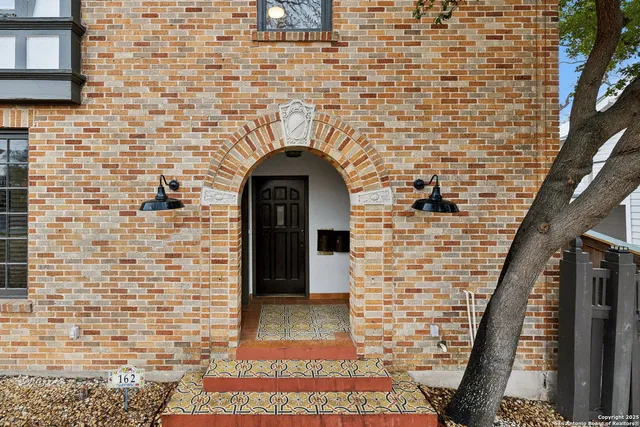 a brick building with a sink