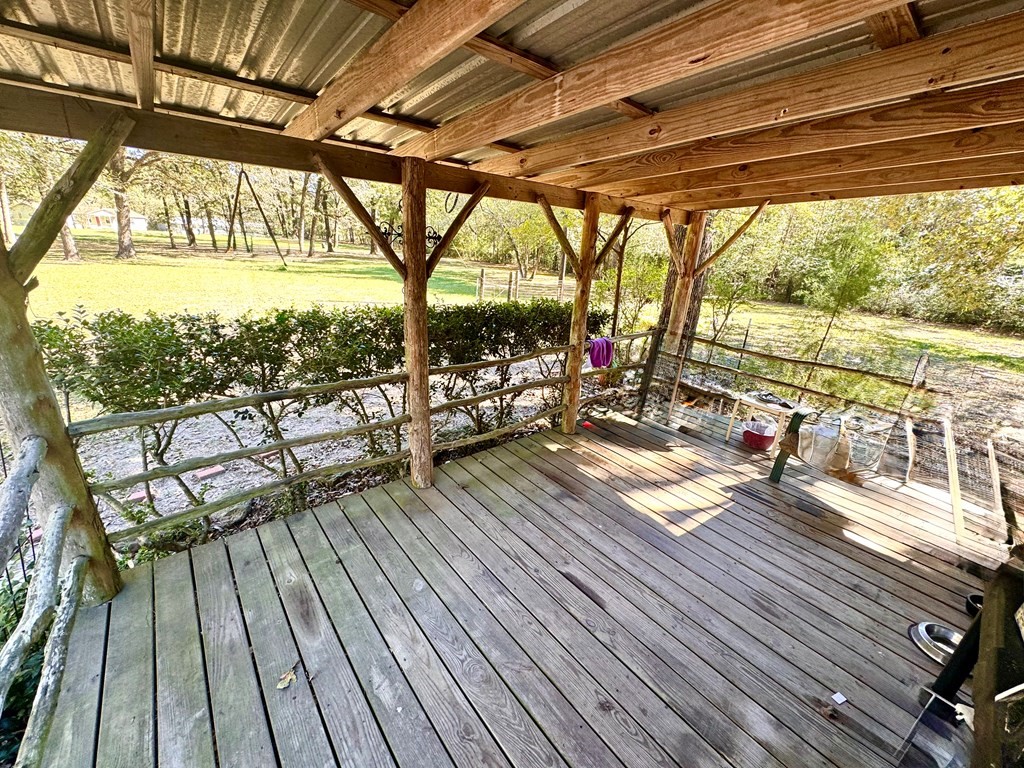 690 Jim Fenley Loop Lufkin, TX 75901 - Photo 17 of 22 a view of a balcony with wooden floor
