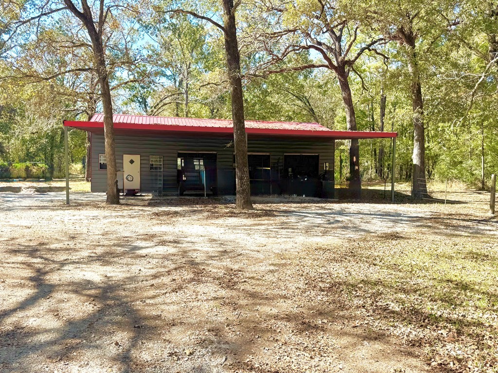 690 Jim Fenley Loop Lufkin, TX 75901 - Photo 6 of 22 a house view with a outdoor space