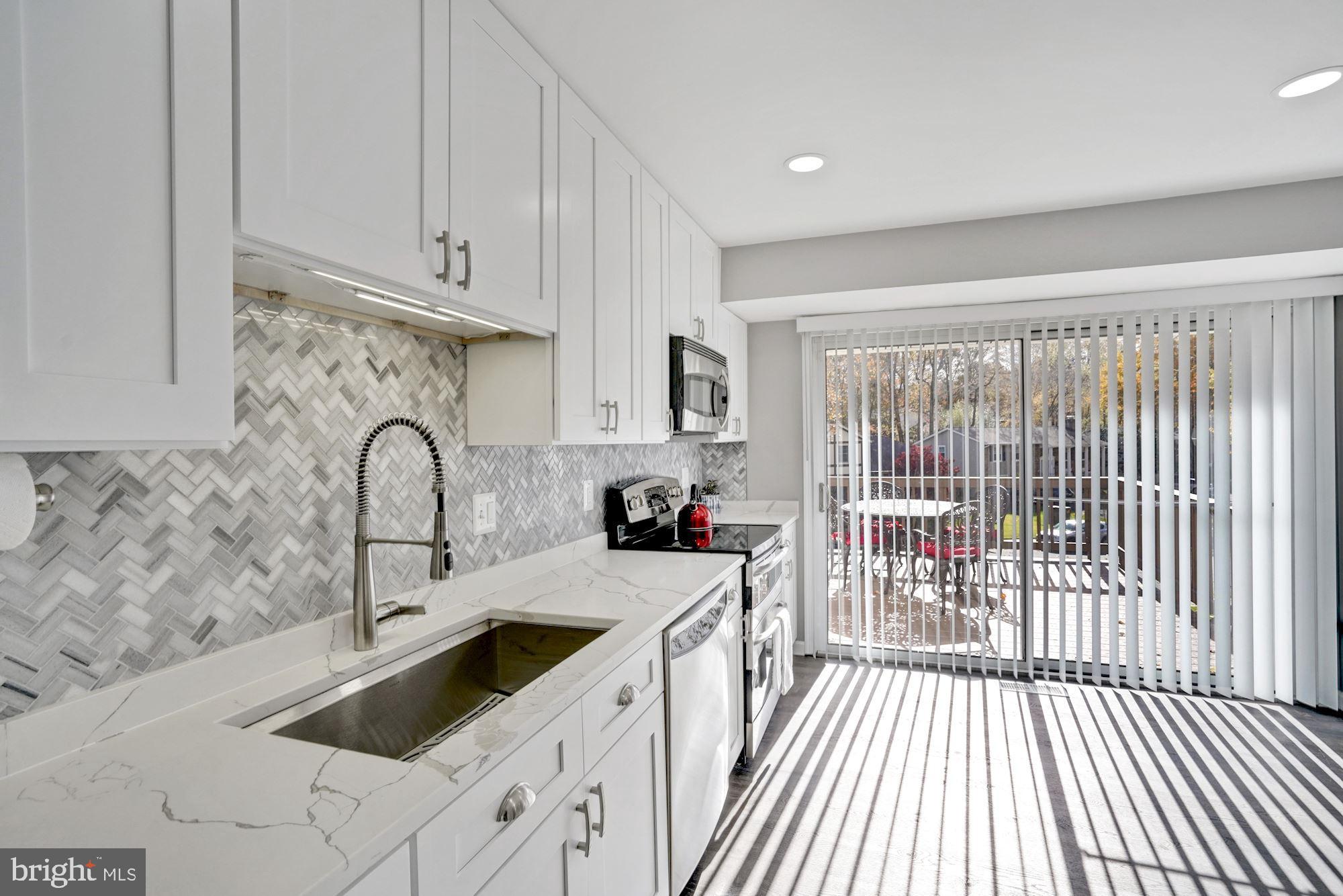8915 Spur Road Springfield, VA 22153 - Photo 11 of 35 Beautiful Kitchen with lots of Natural Light.