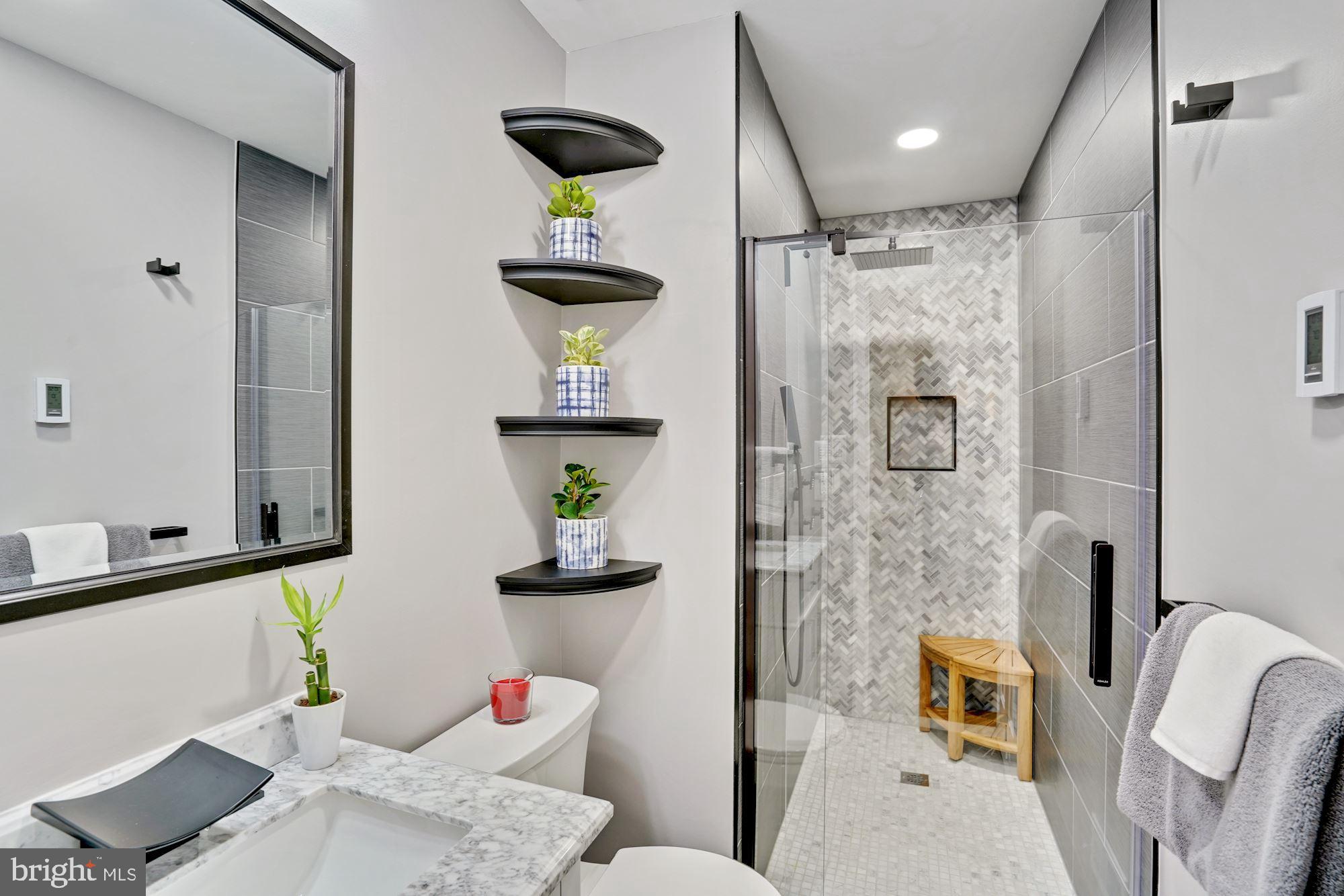 8915 Spur Road Springfield, VA 22153 - Photo 15 of 35 Heated Floor and Spa Shower.