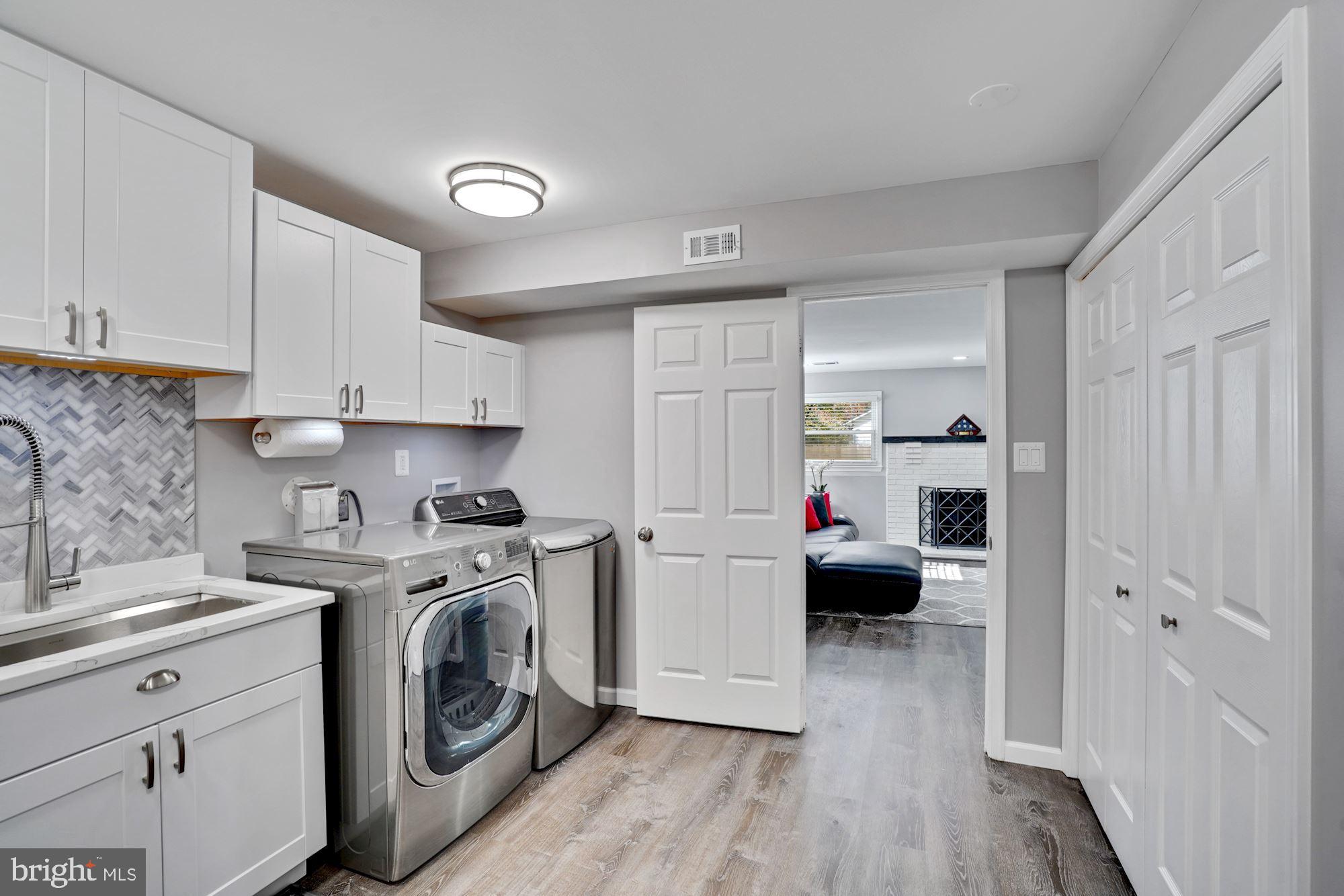 8915 Spur Road Springfield, VA 22153 - Photo 21 of 35 Laundry room with storage.