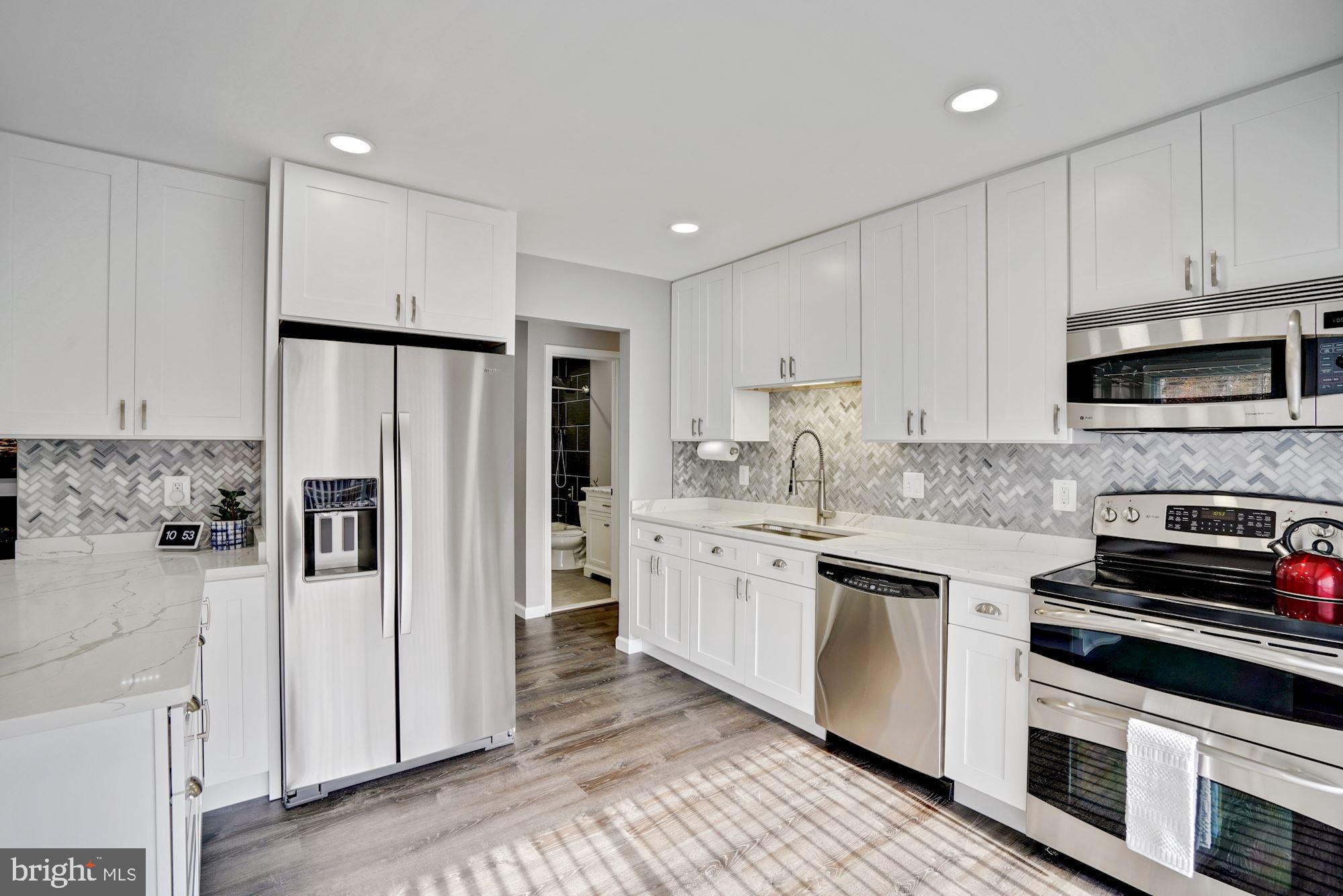 8915 Spur Road Springfield, VA 22153 - Photo 8 of 35 White Shaker Cabinets with lots of storage