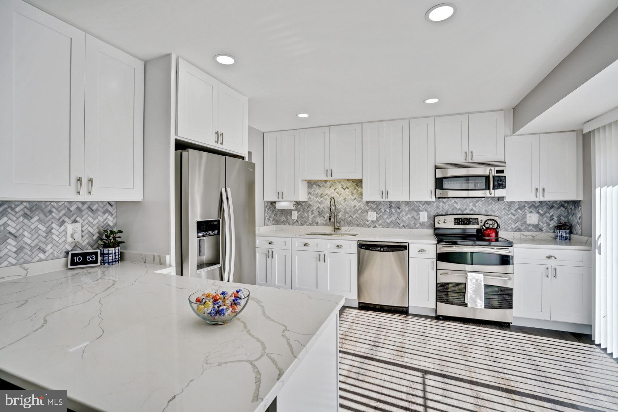 8915 Spur Road Springfield, VA 22153 - Photo 10 of 35 Marble Counters and Marble backsplash