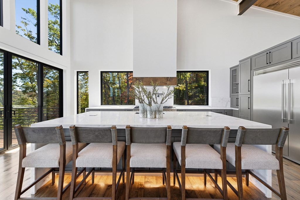 321 Skylight Drive Blue Ridge, GA 30513 - Photo 20 of 89 a view of a dining room with furniture and window