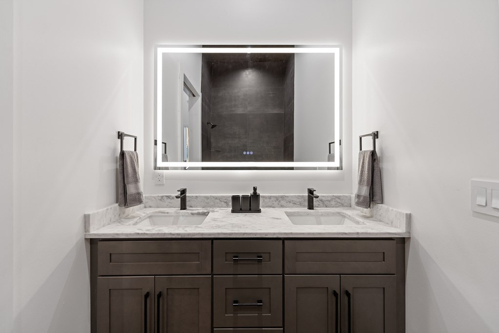 321 Skylight Drive Blue Ridge, GA 30513 - Photo 52 of 89 a bathroom with a sink and a mirror