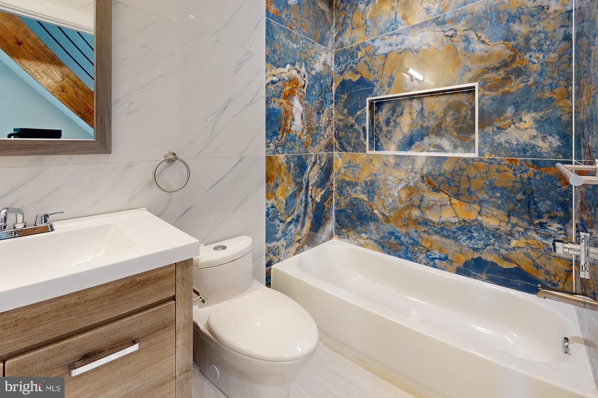 511 North Paxon Street Philadelphia, PA 19131 - Photo 16 of 33 a bathroom with a sink a toilet and shower