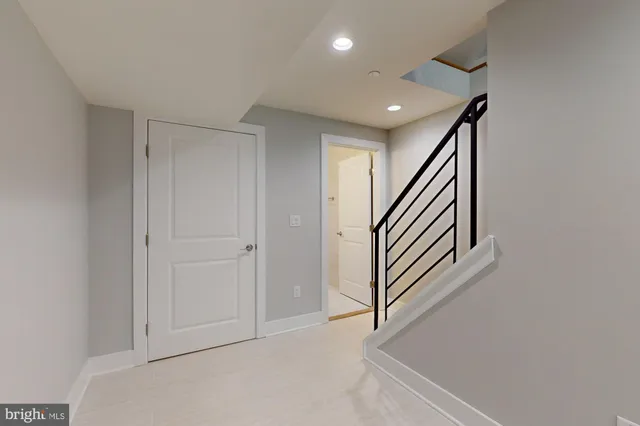 a view of a hallway with staircase