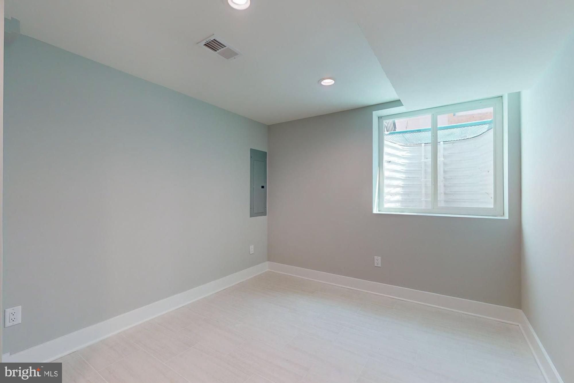 511 North Paxon Street Philadelphia, PA 19131 - Photo 24 of 33 an empty room with a window