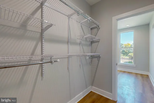 a view of a room with racks on the wall