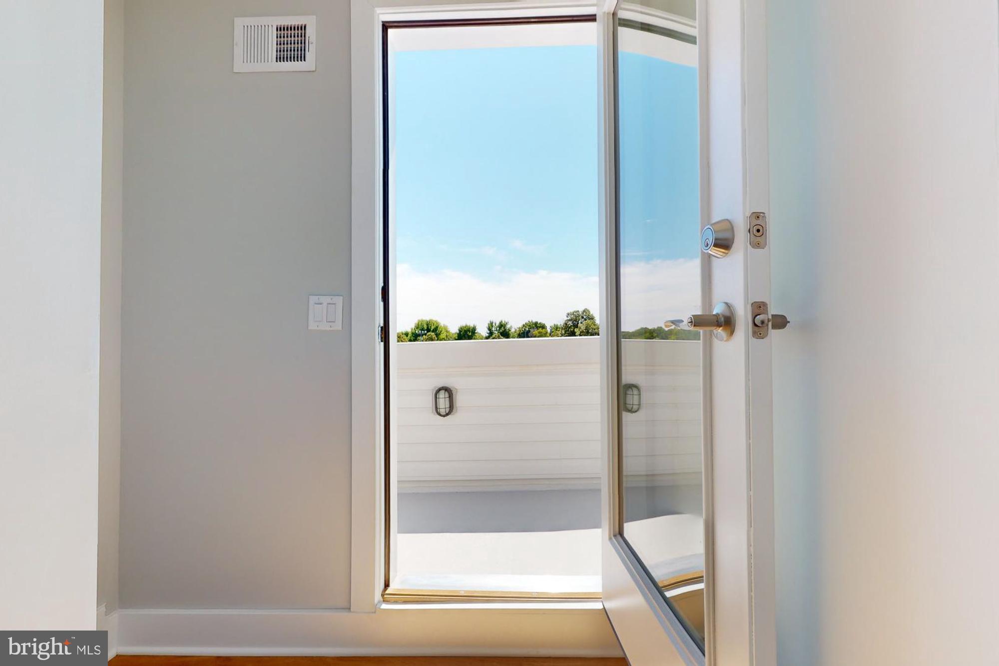 511 North Paxon Street Philadelphia, PA 19131 - Photo 30 of 33 a bathroom with a glass shower door