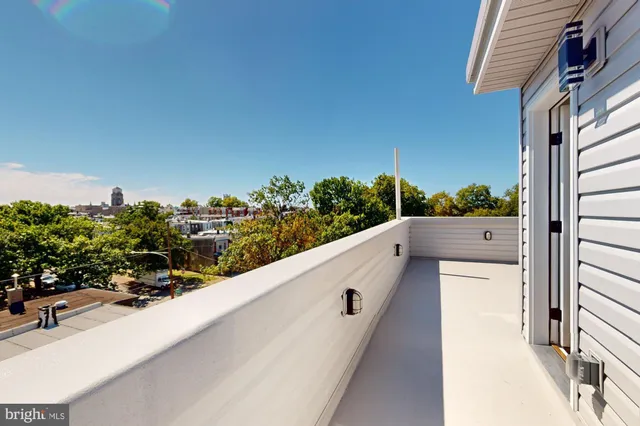 a view of a balcony with an outdoor space
