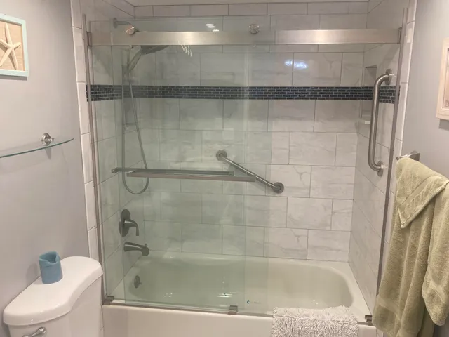 a view of a livingroom with furniture and staircase