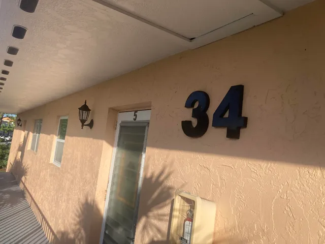 a view of room with window and entryway