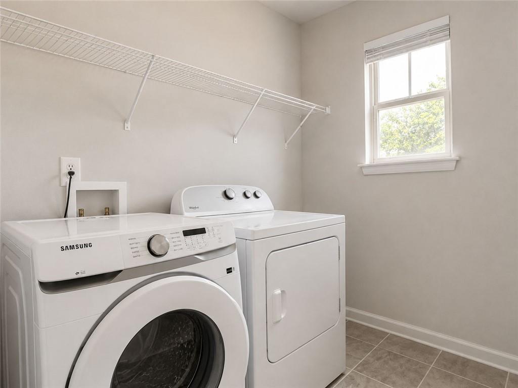 3359 Elkhorn Ridge Run Dacula, GA 30019 - Photo 25 of 35 a utility room with dryer and washer