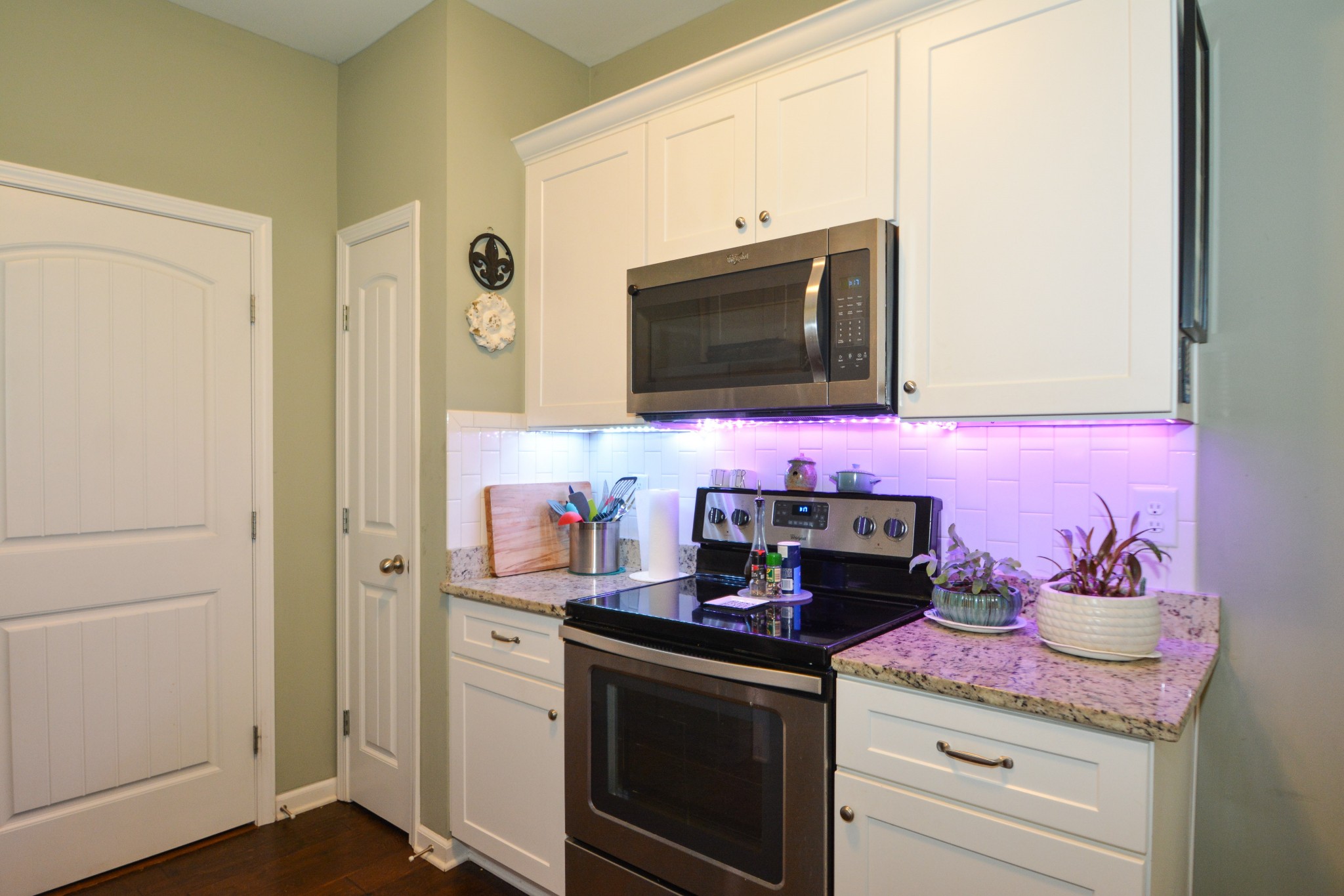 2293 Cason Lane Murfreesboro, TN 37128 - Photo 13 of 32 a kitchen with a stove and cabinets
