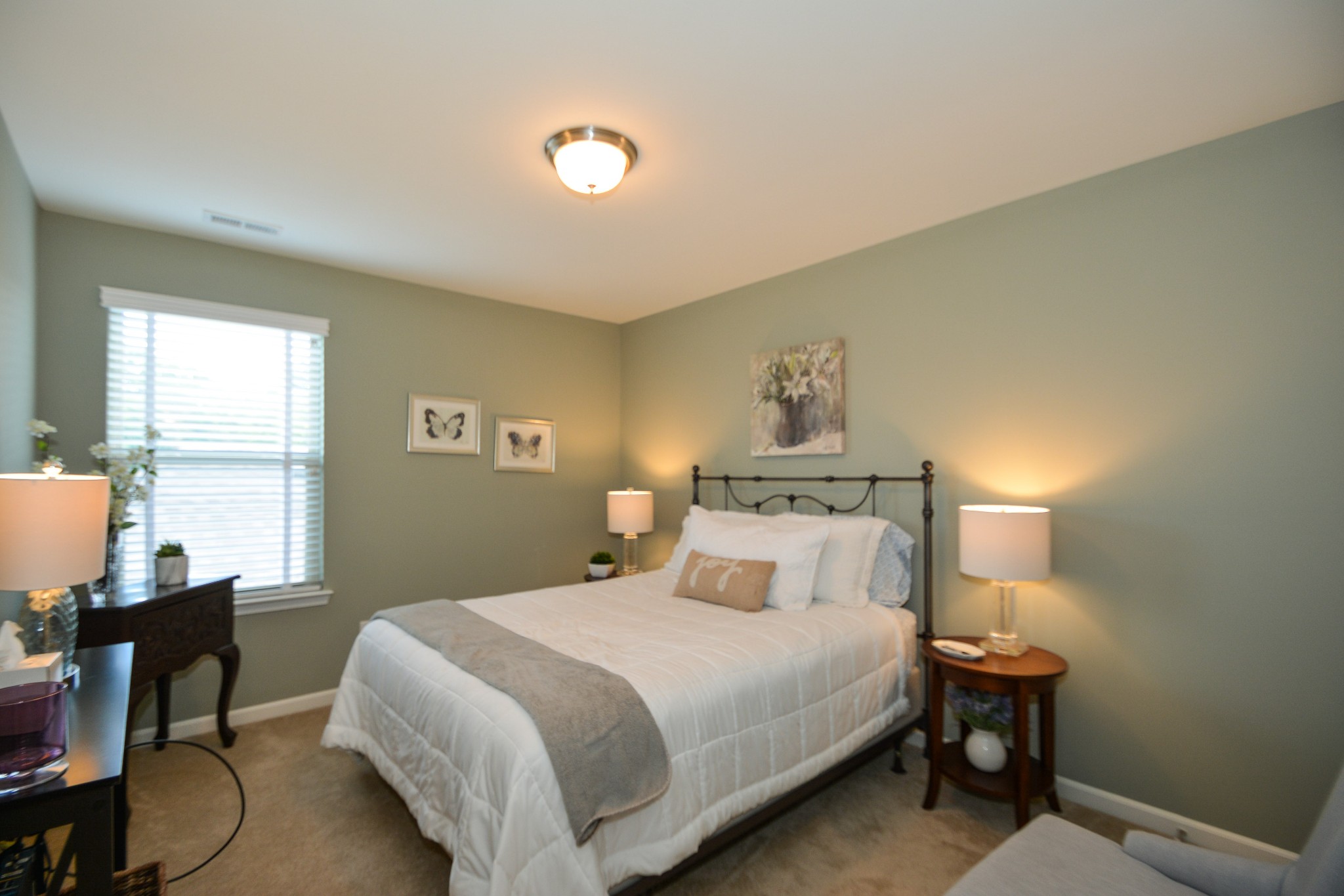 2293 Cason Lane Murfreesboro, TN 37128 - Photo 25 of 32 a bedroom with a bed and a table in it with window