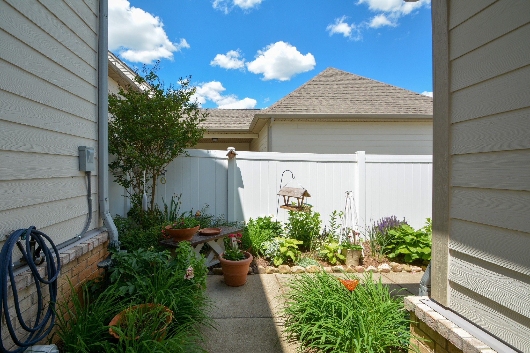 2293 Cason Lane Murfreesboro, TN 37128 - Photo 30 of 32 a view of a backyard with potted plants