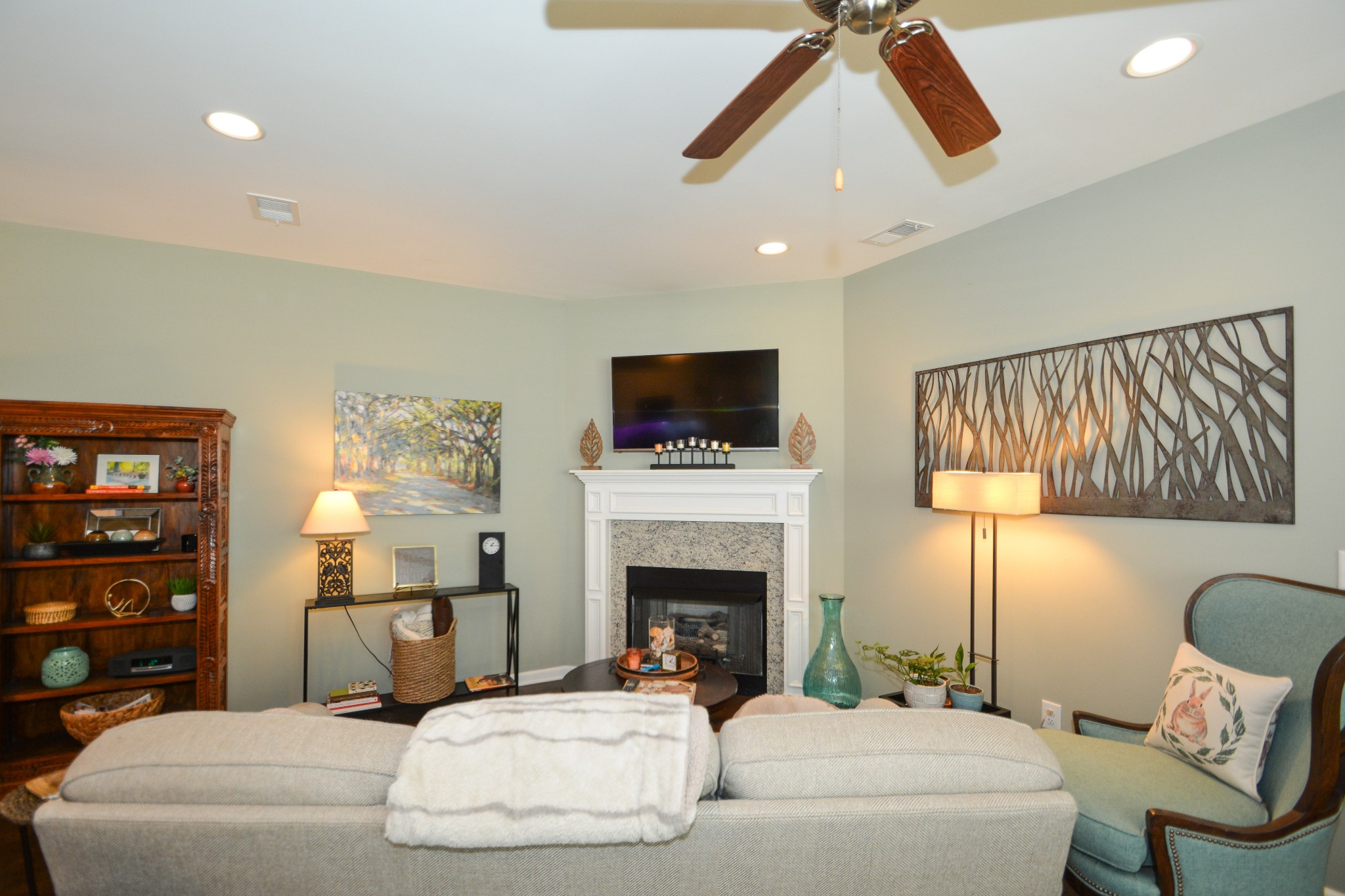 2293 Cason Lane Murfreesboro, TN 37128 - Photo 8 of 32 a living room with furniture a flat screen tv and a fireplace