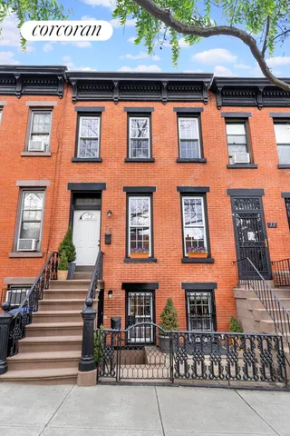 a black and white photo of a living room