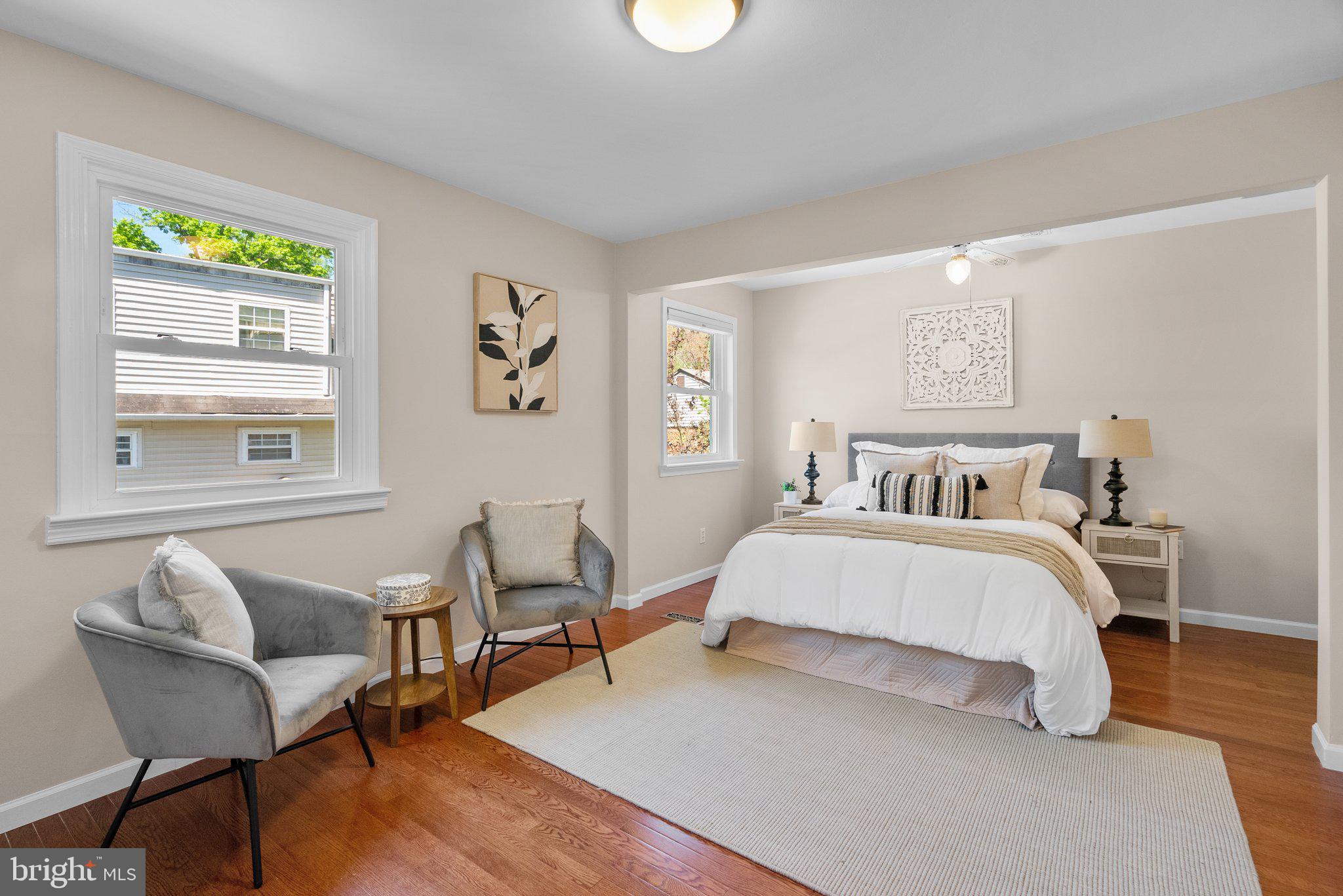 1007 Helena Drive Silver Spring, MD 20901 - Photo 11 of 39 a spacious bedroom with a bed and wooden floor