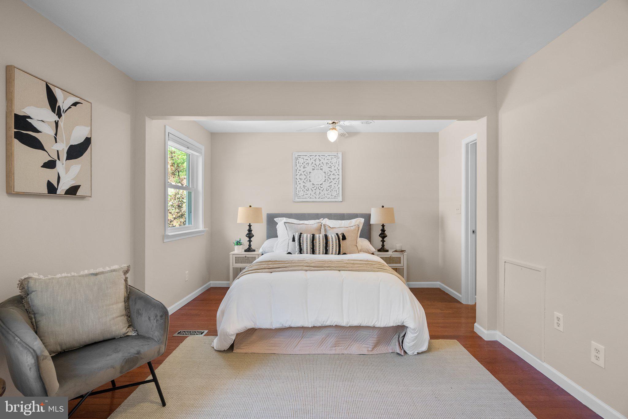 1007 Helena Drive Silver Spring, MD 20901 - Photo 12 of 39 a bedroom with a bed and couch