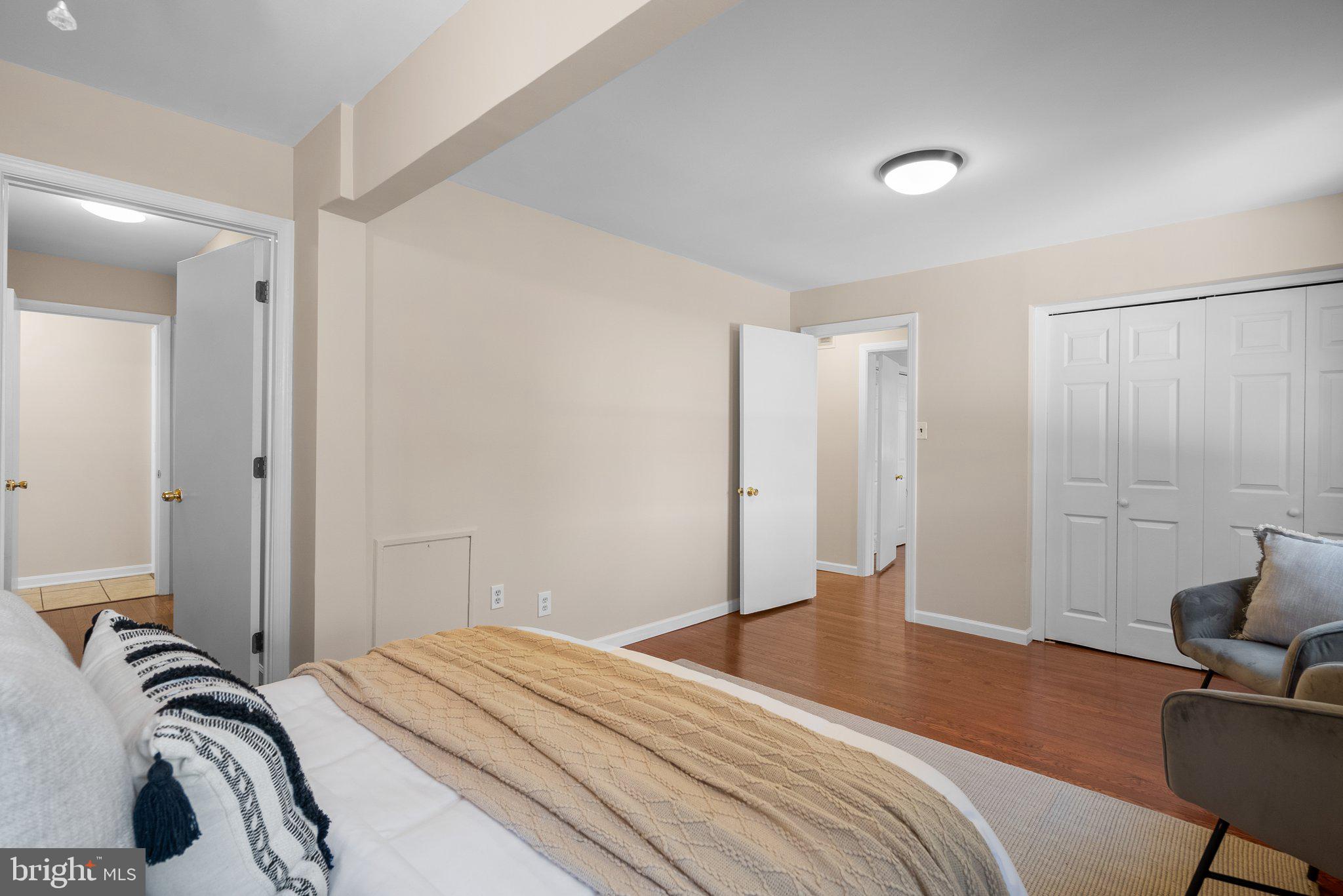 1007 Helena Drive Silver Spring, MD 20901 - Photo 13 of 39 a bedroom with a bed and a chair