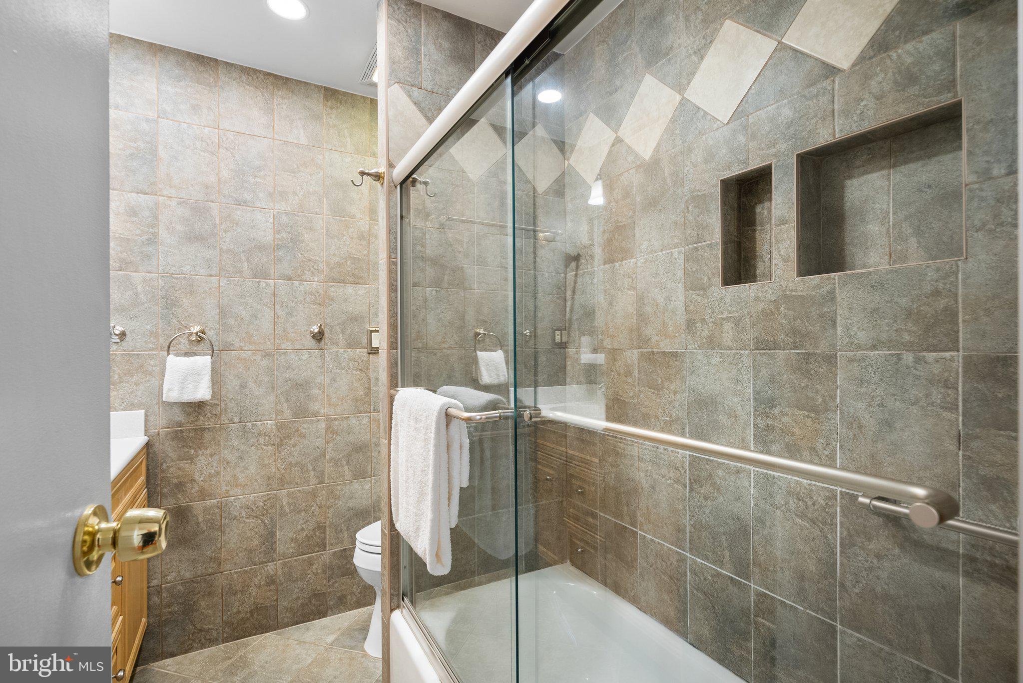 1007 Helena Drive Silver Spring, MD 20901 - Photo 15 of 39 a bathroom with a shower