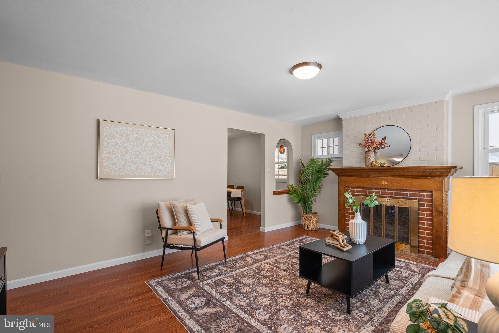 1007 Helena Drive Silver Spring, MD 20901 - Photo 2 of 39 a living room with furniture and a fireplace