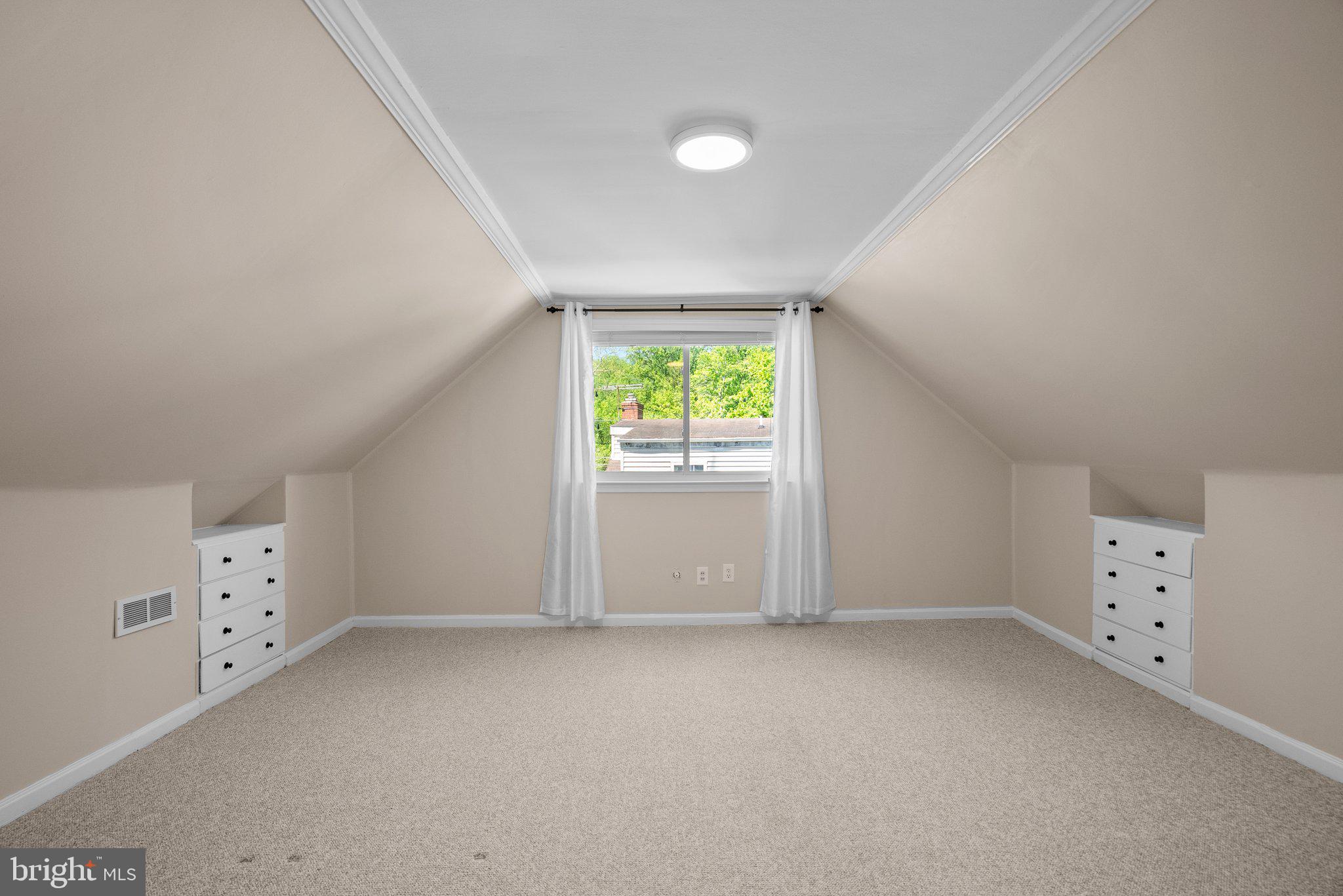1007 Helena Drive Silver Spring, MD 20901 - Photo 22 of 39 an empty room with a window and dresser