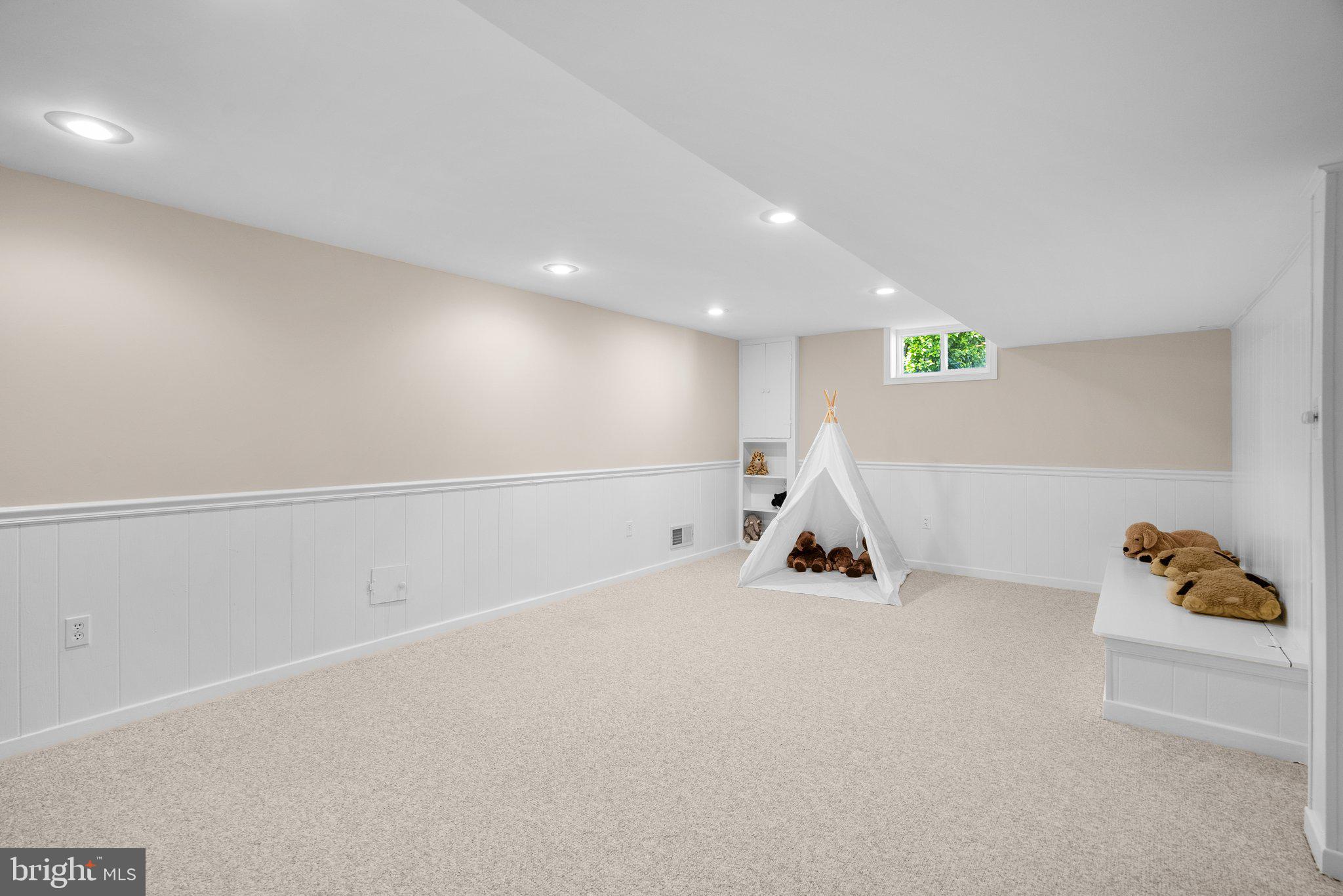 1007 Helena Drive Silver Spring, MD 20901 - Photo 25 of 39 a room with gym equipment and wooden floor