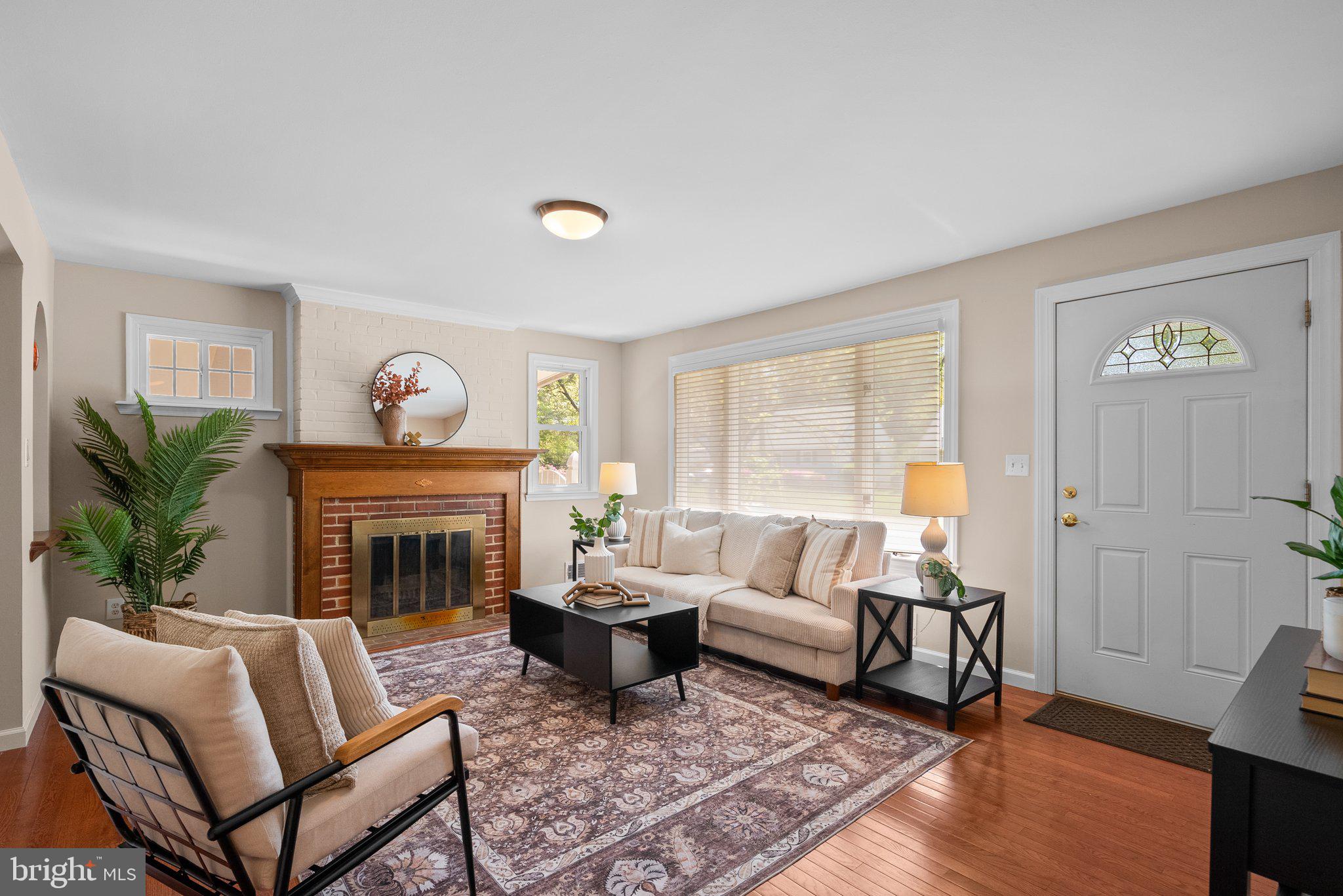 1007 Helena Drive Silver Spring, MD 20901 - Photo 3 of 39 a living room with furniture and a fireplace