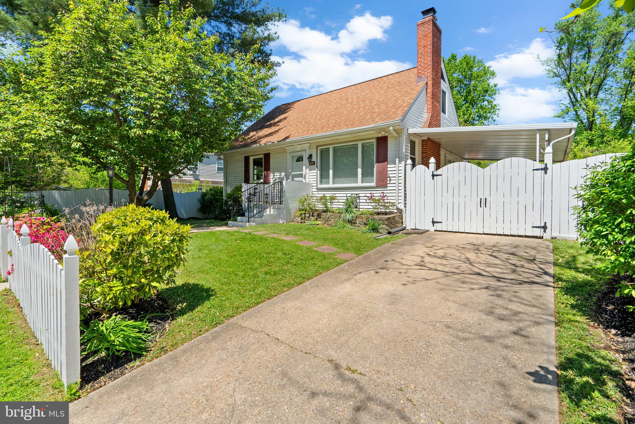 1007 Helena Drive Silver Spring, MD 20901 - Photo 35 of 39 a view of a house with a yard and potted plants