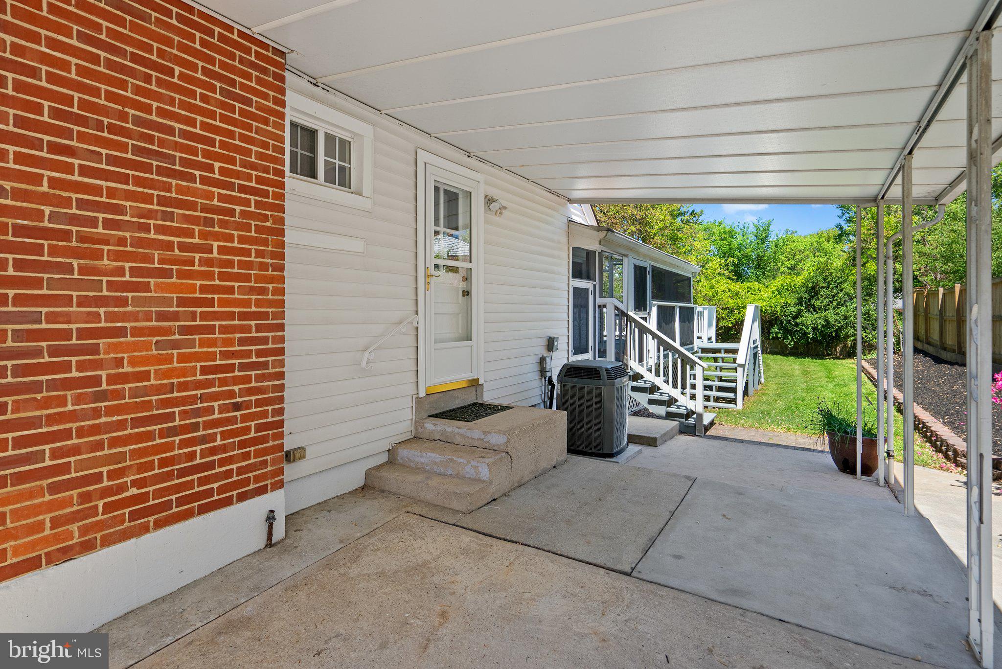 1007 Helena Drive Silver Spring, MD 20901 - Photo 36 of 39 a view of a patio with couches chairs and potted plants