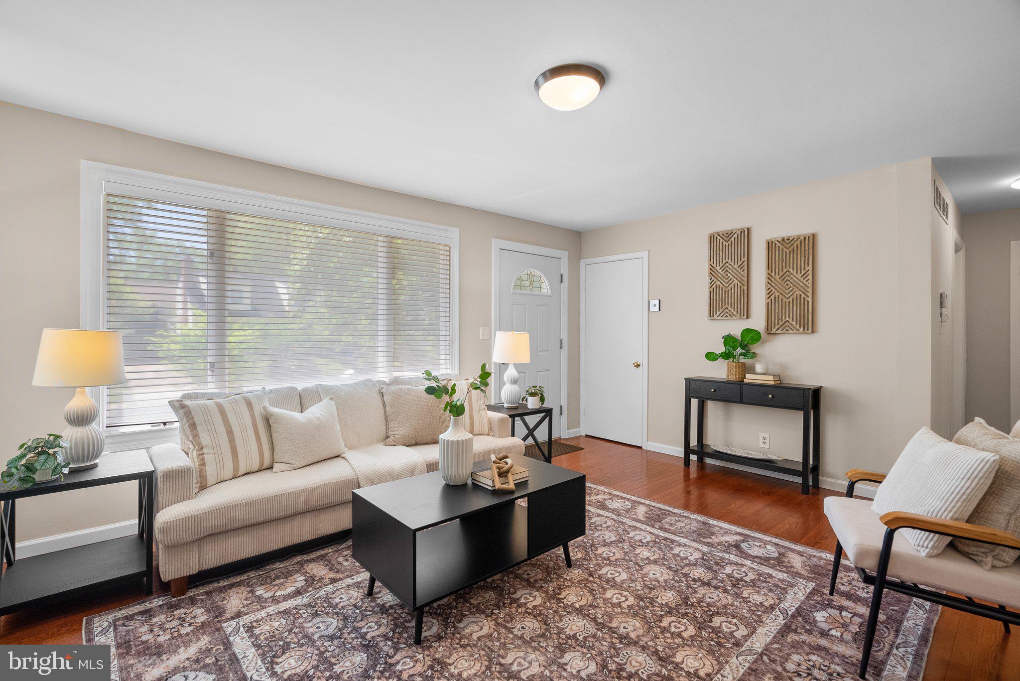 1007 Helena Drive Silver Spring, MD 20901 - Photo 4 of 39 a living room with furniture and wooden floor