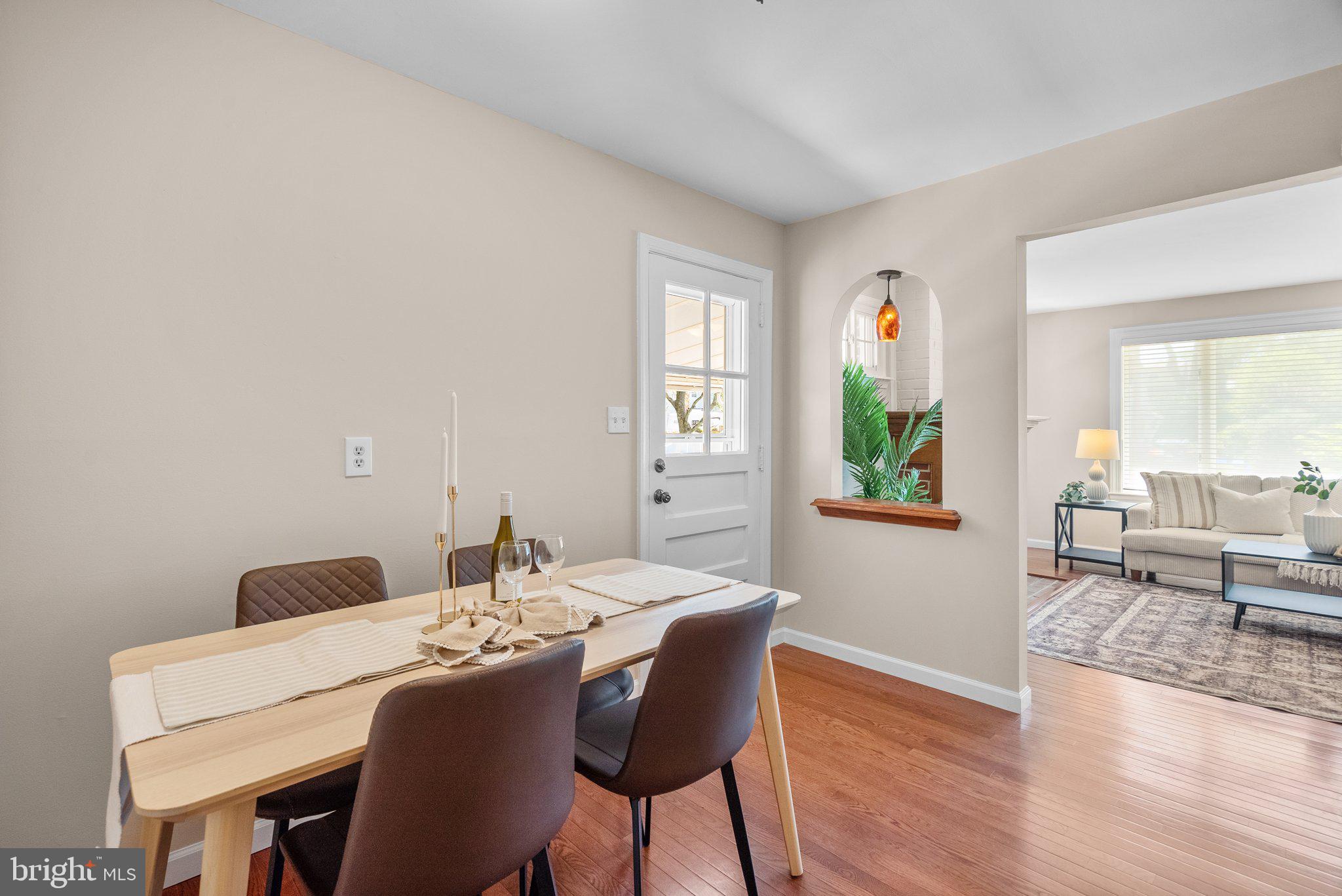 1007 Helena Drive Silver Spring, MD 20901 - Photo 5 of 39 a view of a dining room with furniture window and wooden floor