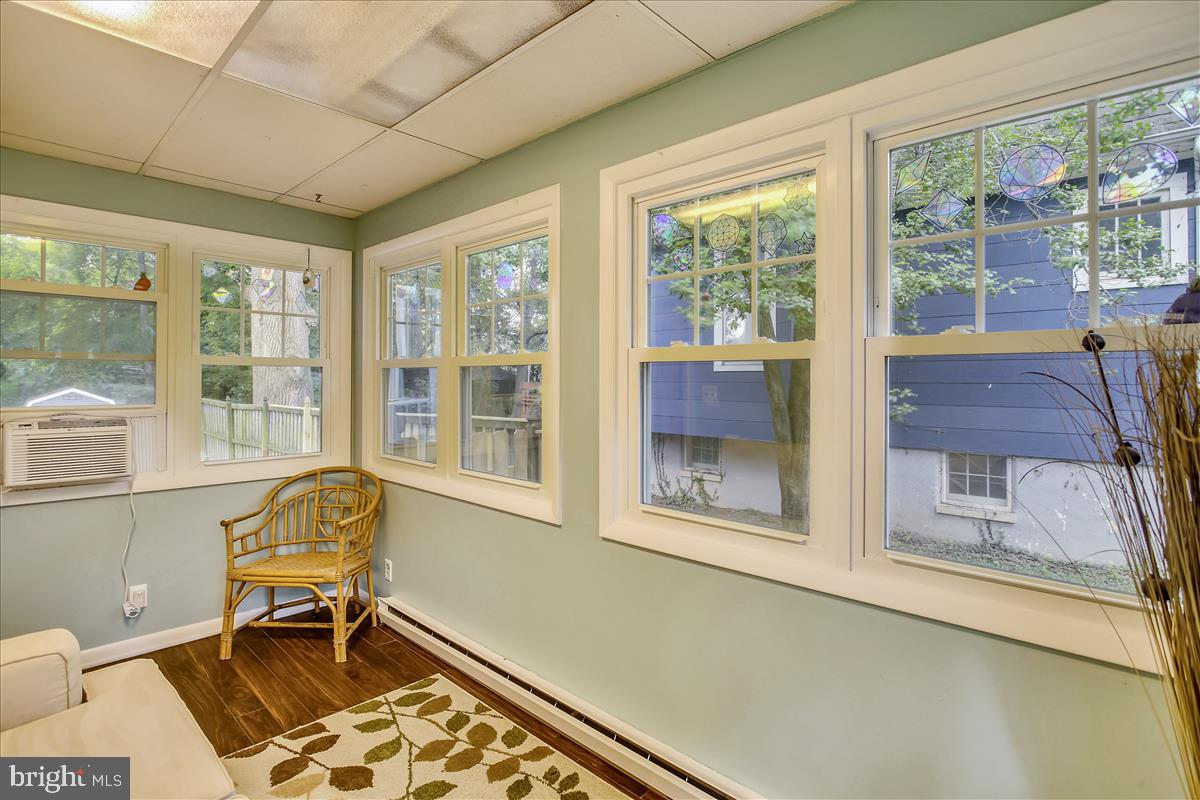 5313 Wendley Road Baltimore, MD 21229 - Photo 18 of 37 Sunroom off living room with plenty of windows
