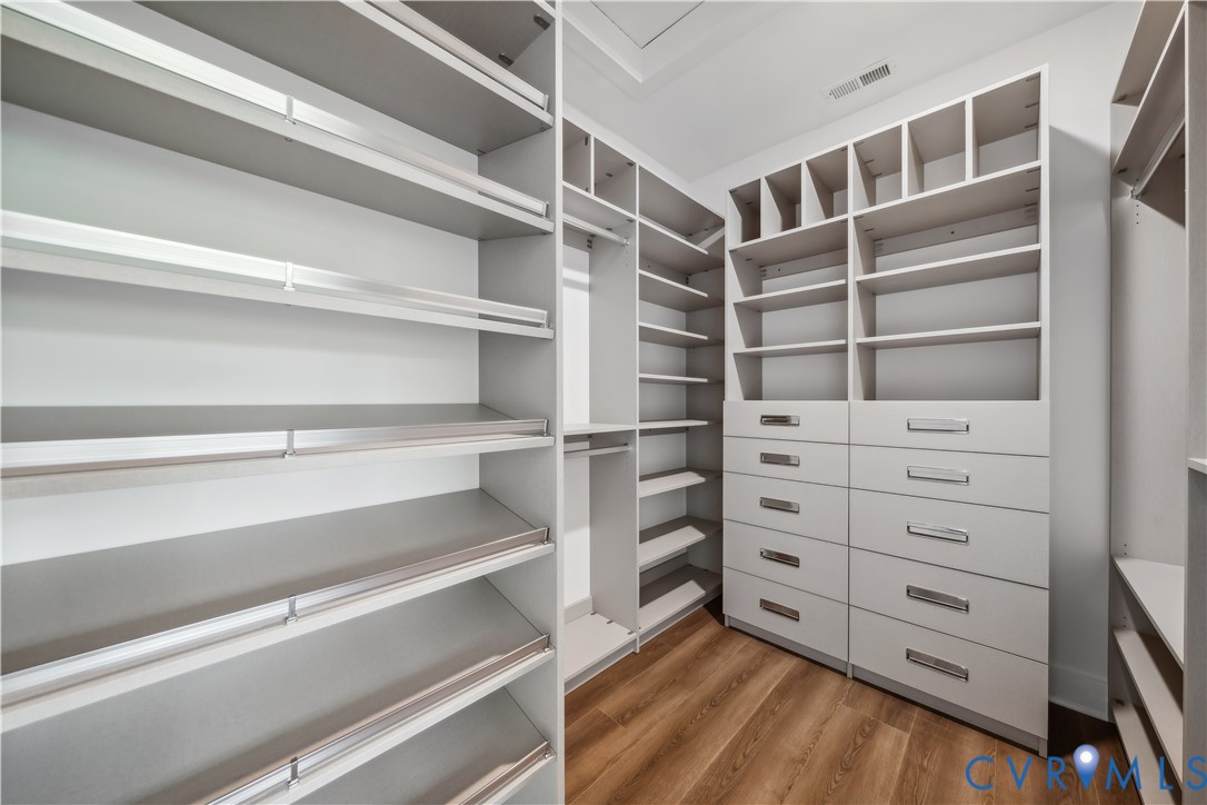 114 Logan Way Tappahannock, VA 22560 - Photo 18 of 28 a view of walk in closet with empty racks