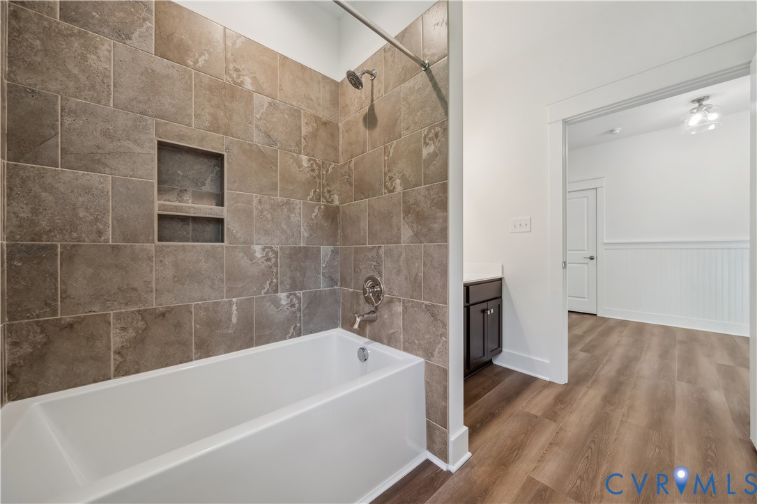 114 Logan Way Tappahannock, VA 22560 - Photo 23 of 28 a bathroom with a bathtub and a shower