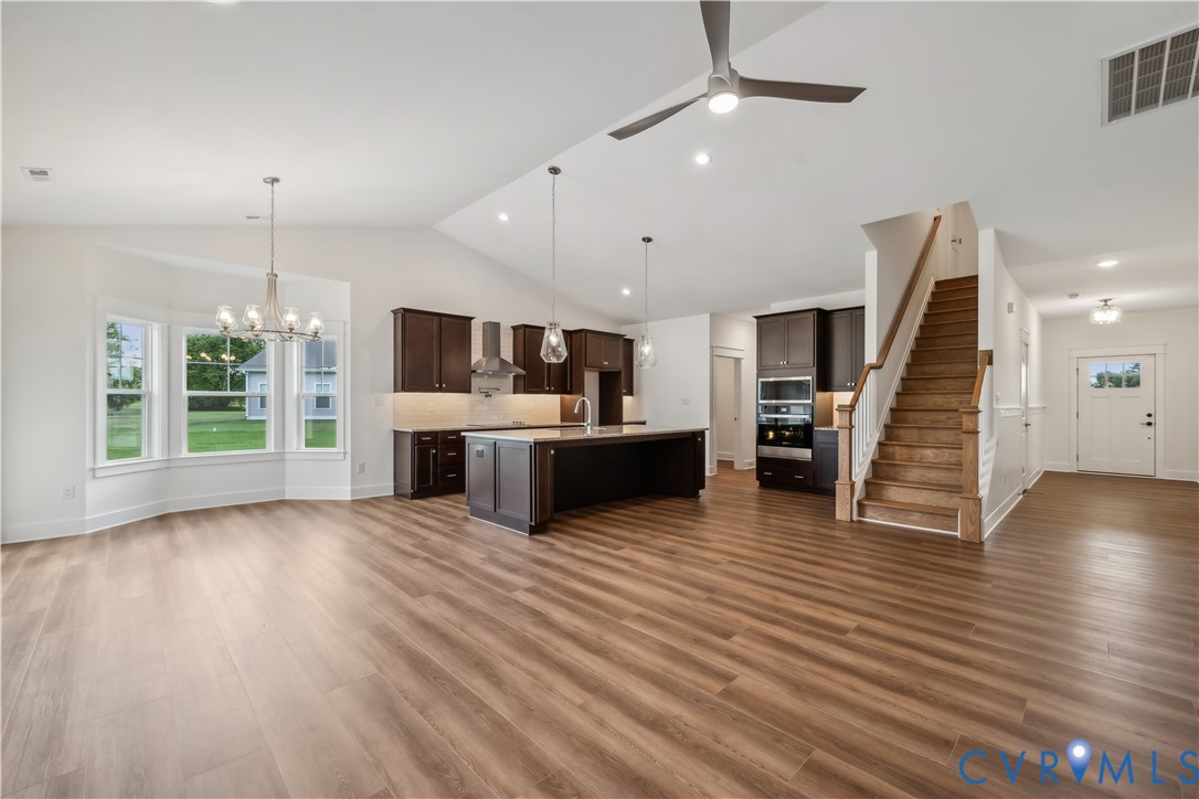 114 Logan Way Tappahannock, VA 22560 - Photo 5 of 28 a view of kitchen with cabinets and wooden floor