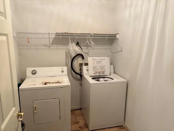 a utility room with dryer and washer