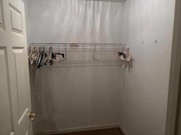 a view of a room with racks on the wall