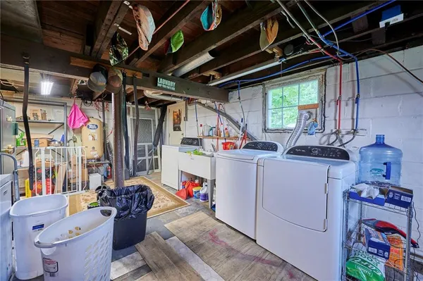 a storage room with washer and dryer