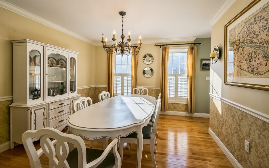 10 Intervale Road Marblehead, MA 01945 - Photo 11 of 32 a view of a dining room with furniture window and wooden floor