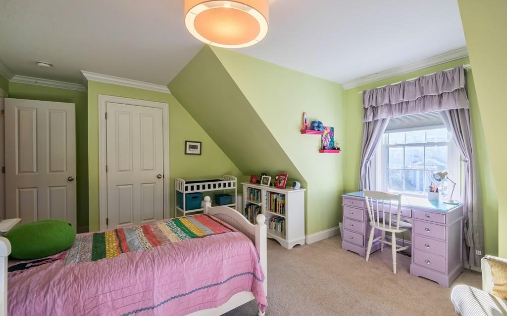 10 Intervale Road Marblehead, MA 01945 - Photo 17 of 32 a bedroom with bed and a chandelier